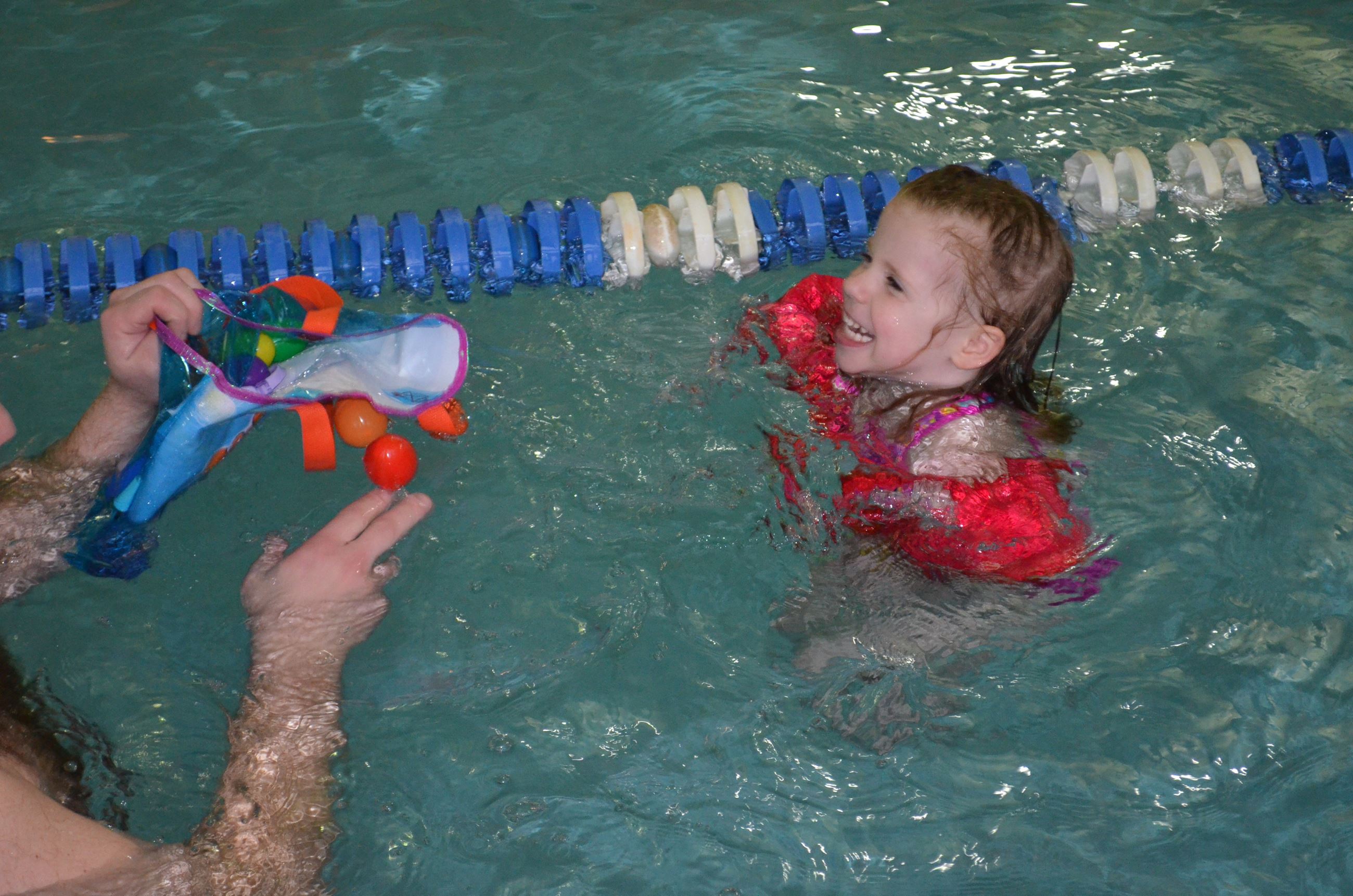Girl in Pool Water Egg Hunt