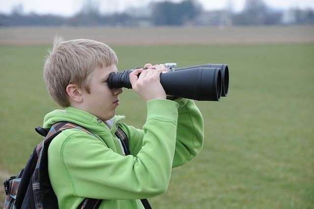 boy with binoculars
